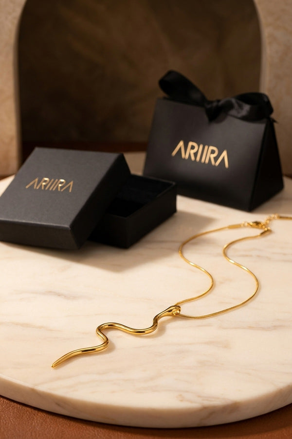 gold India Gold Tone Wavy Serpent Pendant