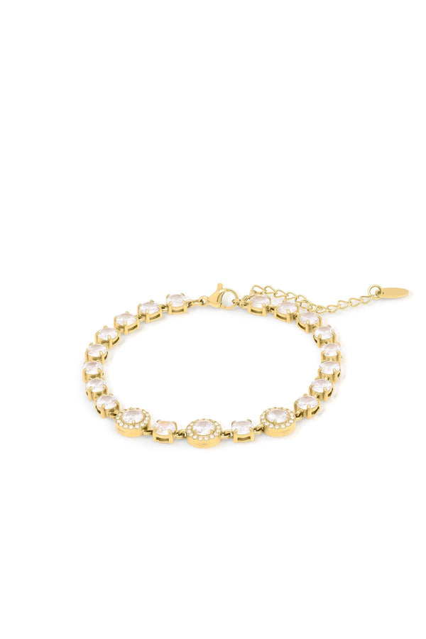 Amira Gold Diamante Tennis Bracelet featuring gold-plated stainless steel and shimmering stones for an elegant touch.