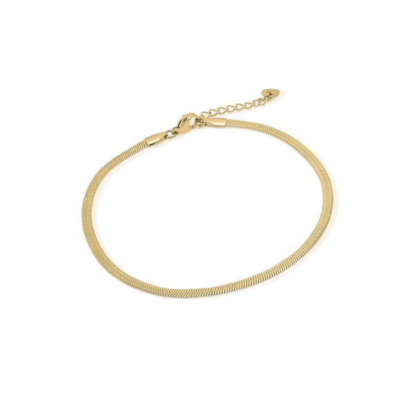 Layla Gold Herringbone Anklet by ARIIRA, a delicate gold-plated stainless steel anklet with a luxurious herringbone design.