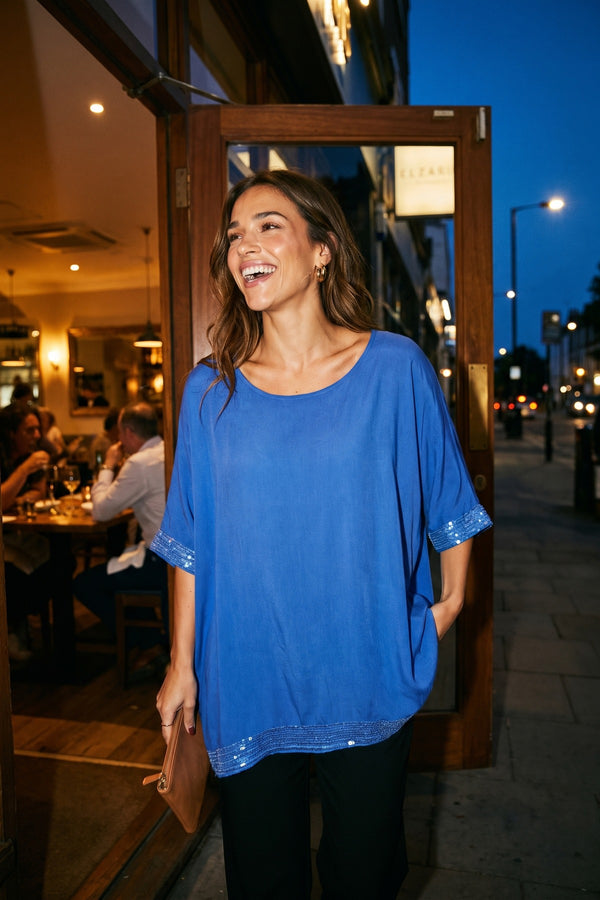 Amber Oversized Sequin Hem Flare Sleeve Top - Royal