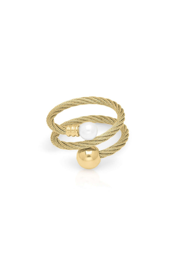 Sana Double Orb Twist Ring by ARIIRA featuring a twisted rope design with smooth gold and pearl orbs.