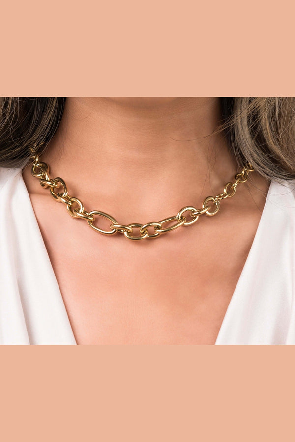 Elegant ARIIRA Sandra Oval Link Statement Chain Necklace, showcasing polished oval links for a bold and modern look.